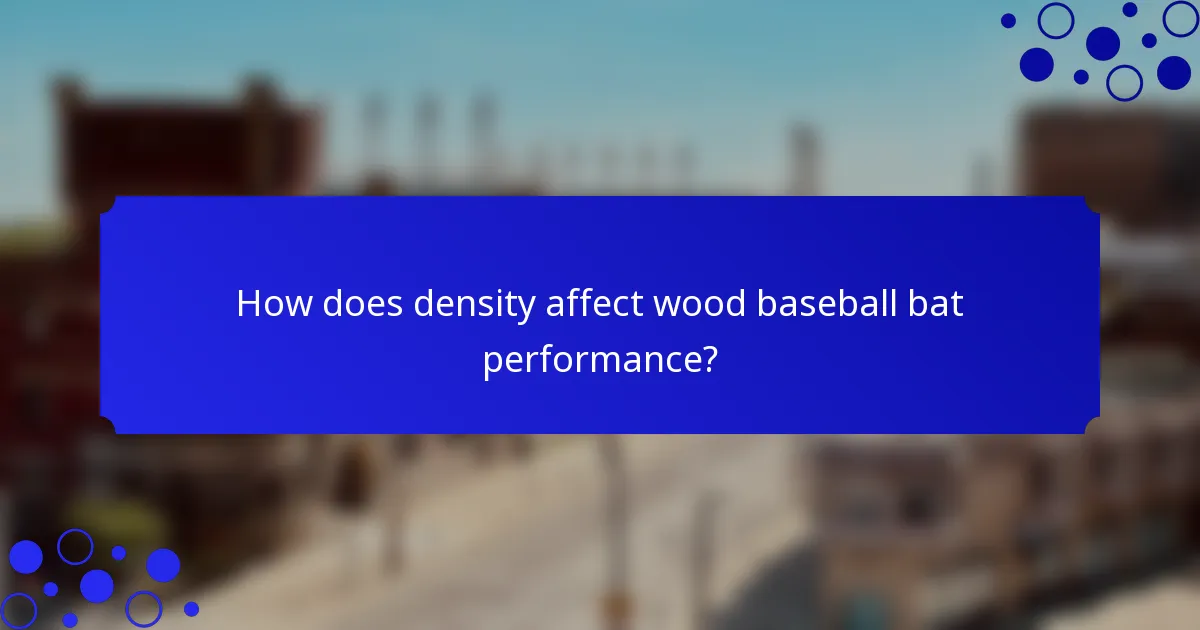 How does density affect wood baseball bat performance?