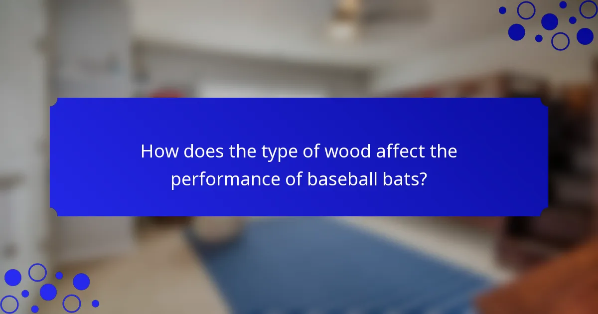 How does the type of wood affect the performance of baseball bats?
